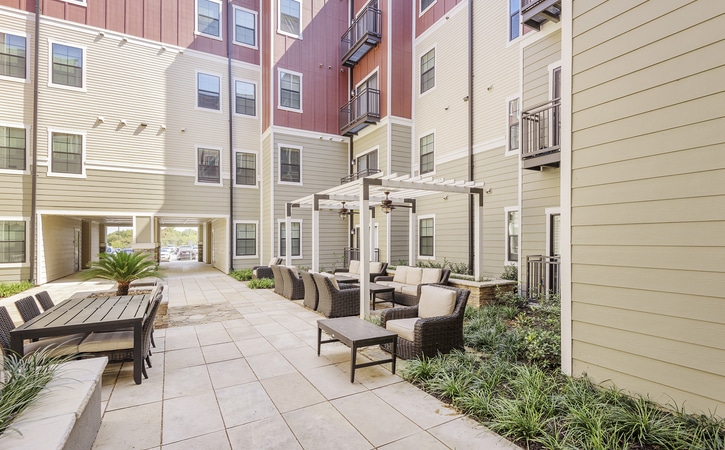 arba san marcos off campus apartments near texas state university courtyard lounging areas